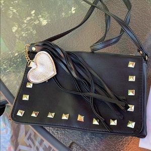 This is an adorable crossbody  bag